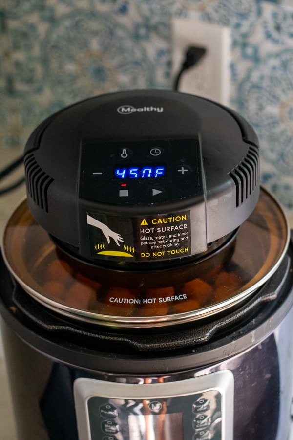 the crsiplid is place on pressure cooker and programed