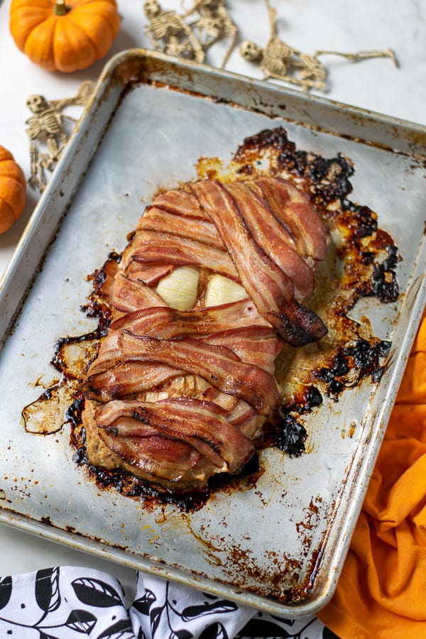 halloween meatloaf mummy a tray with onion teeth and eyes