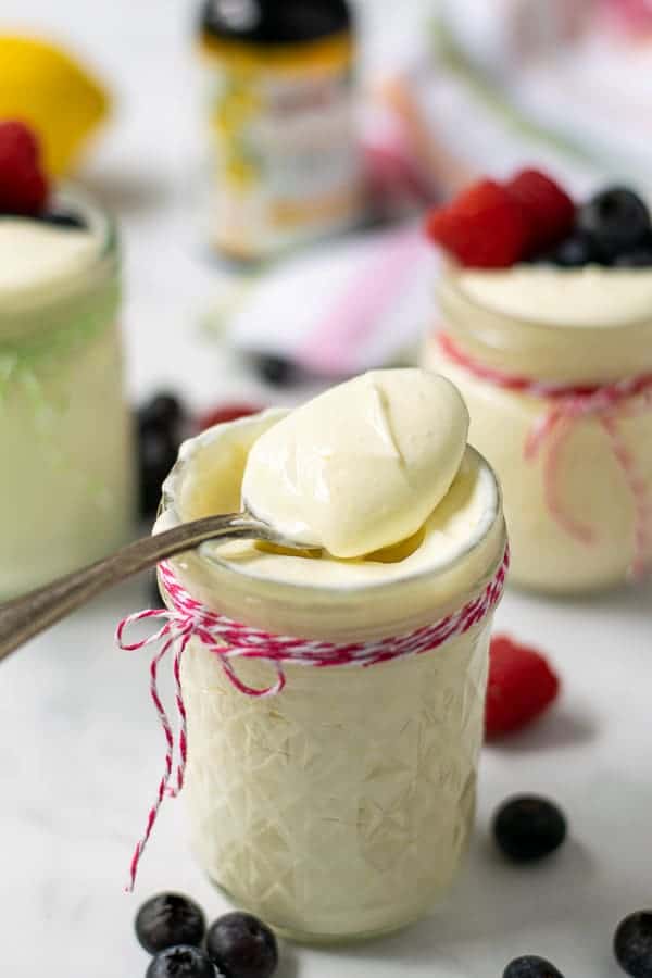 spoonful of lemon whipped greek yogurt in a jar