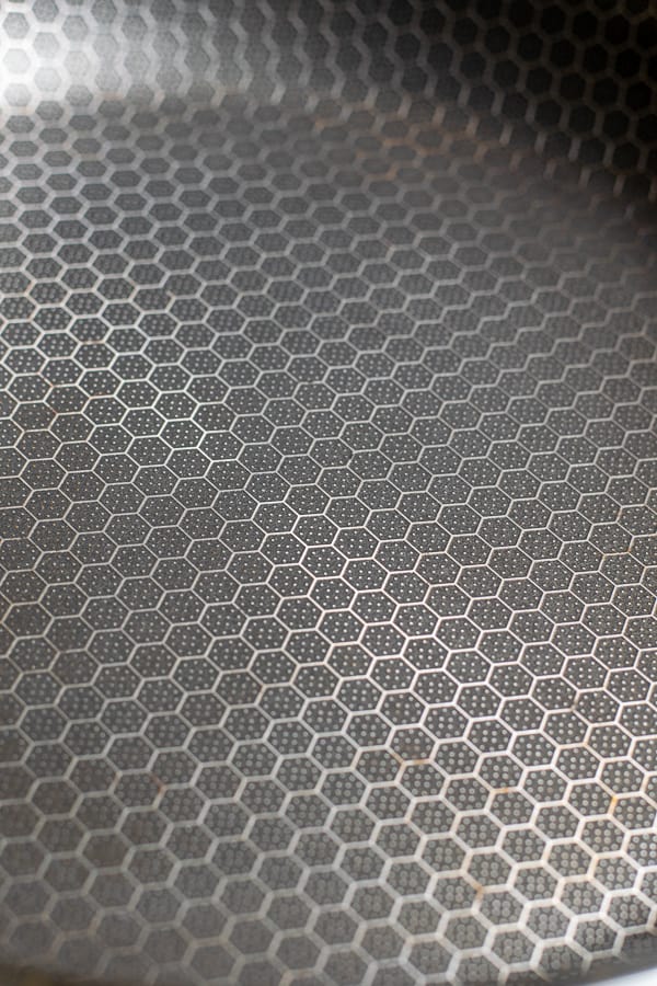 close up of the laser etched honey comb technology in the Mealthy non-stick pan