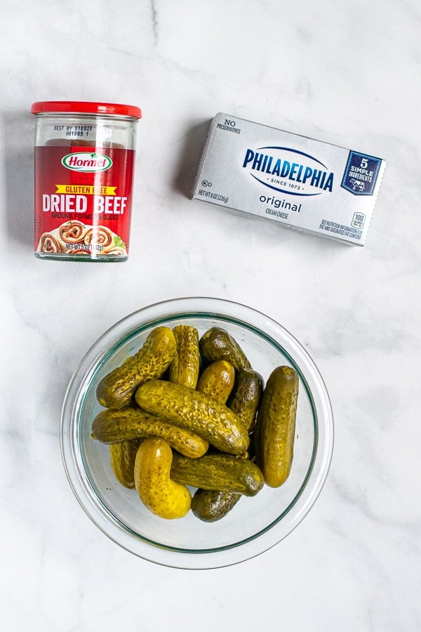 flatly of the three ingredients dried beef, baby dill pickles, and cream cheese