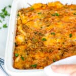 overnight tex mex breakfast casserole in a white baking dish