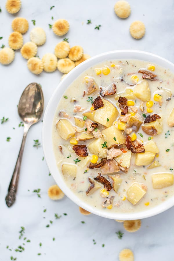 bowl of New England clam chowder with fresh thyme