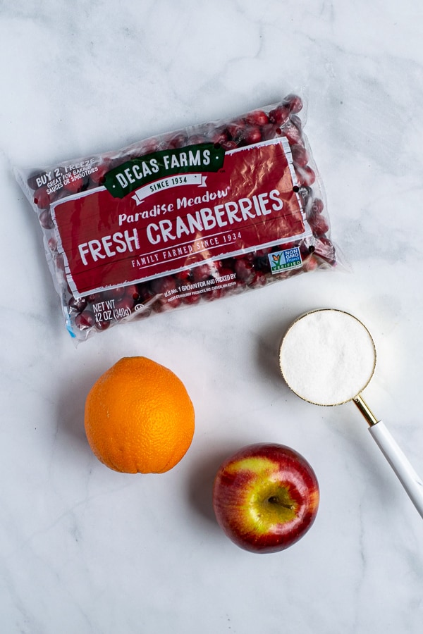 cranberries, oranges, apples, and sugar, the ingredients for the best cranberry relish