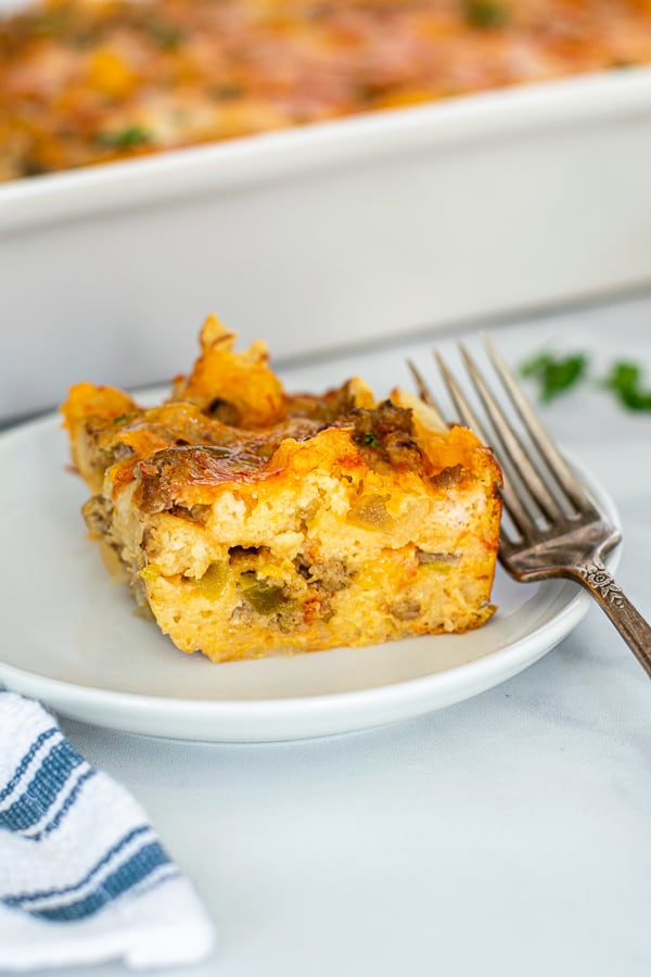 a pice of the tex-mex breakfast casserole on a small white plate