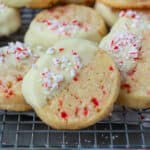 a close up of a white choclate dipped peppermint slice and bake cookie