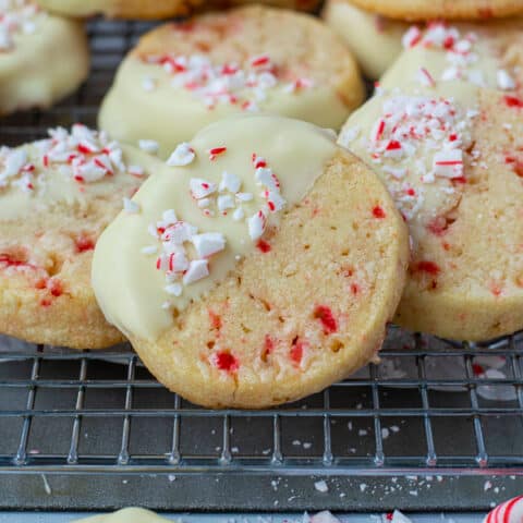 close up of a white chocolate dipped peppermint Christmas cookie
