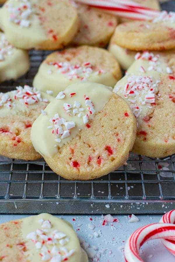 close up of a white chocolate dipped peppermint Christmas cookie