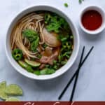 slow cooker beef pho bowl with all of the garnishes