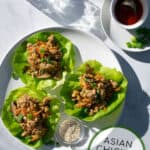 overhead shot of the Chinese Chicken Lettuce Wraps on a white plate