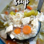 chicken rice soup being ladled out of a large pot