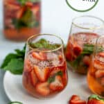 a tray full of strawberry sangria's ready to drink