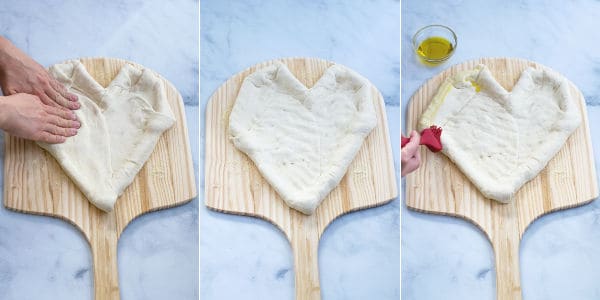 dough being prepped for toppings and olive oil being brushed onto the crust