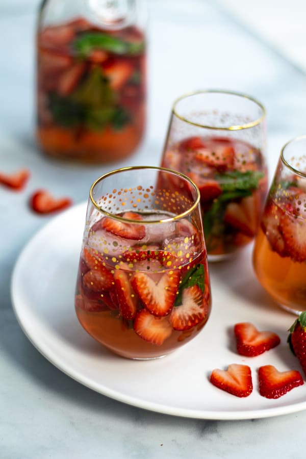 glass of strawberry sangria recipe made with rosé and strawberries