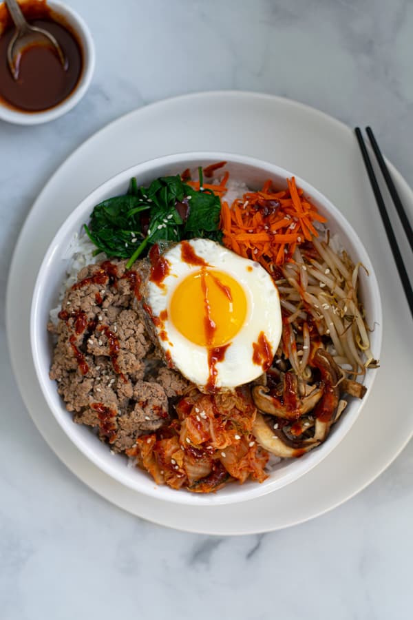 overhead shot of the ground turkey bibimbap bowls