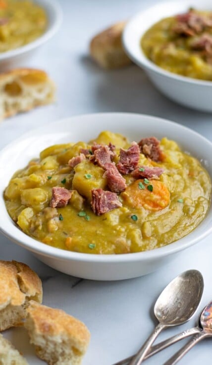 close up of pressure cooker split pea soup with ham in a bowl