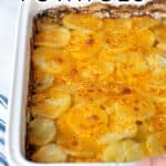 Pinterest Pin for Au Gratin Potatoes, hands holding a casserole dish with potatoes inside