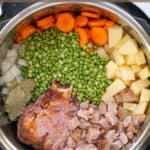 split pea soup ingredients in the pot of a pressure cooker pinterest pin with title and website