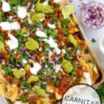 Pork Carnitas Nachos Pinterest Pin with a tray of nachos with cheese and toppings