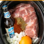 Slow Cooker Pork Carnitas Pinterest Pin showing a crockpot full of the ingredients needed