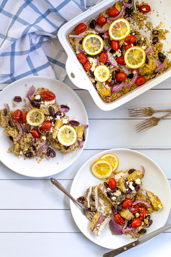 two plates with greek chicken bake as well as some in the baking dish