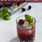 Pinterest Pin for a Blackberry Bourbon Smash with a photo of a red/purple drink in an old fashion glass