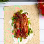 Pinterest Pin for Healthy BLT Wraps showing a photo of an open wrap topped with secret sauce, bacon, lettuce, and tomatoes