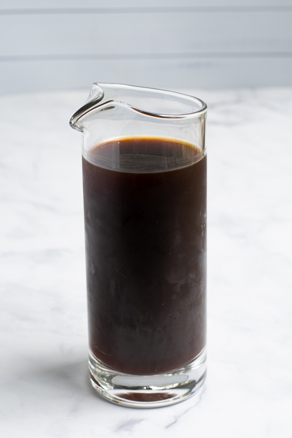 small pitcher filled with freshly brewed homemade cold press coffee