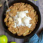 Grilled Apple Crisp Pinterest Pin showing the cooked dessert topped with ice cream