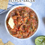 Pinterest Pin for Fresh Restaurant Style Salsa made in a food processor shows overhead view of bowl of salsa with tortilla chips