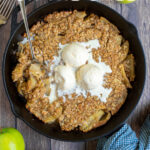 Grilled Apple Crisp Pinterest Pin showing the cooked apple dessert topped with ice cream