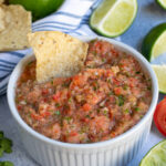 Pinterest Pin for Fresh Restaurant Style Salsa made in a food processor shows small white bowl full of salsa