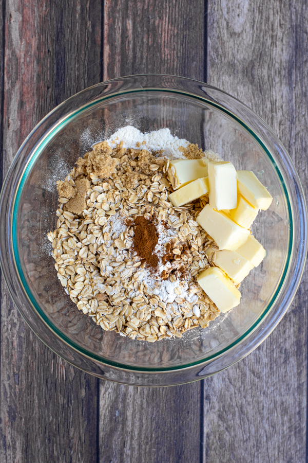 the ingredients for the crisp topping in a glass bowl