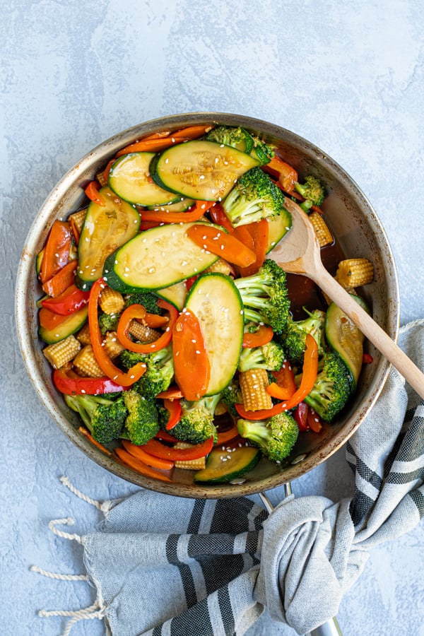 healthy veggie stir fry made with colorful veggies in a skillet