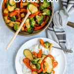 Pinterest Pin for Easy Veggie Stir Fry with a photo of a plate of vegetable stir fry on rice next to a skillet full of colorful veggies