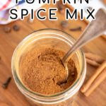 Pinterest Pin with text overlay Homemade Pumpkin Spice Mix, photo of small jar filled with spices and a spoon.