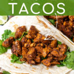 Pinterest Pin with text overlay 'The Easiest Chicken Tacos' showing chicken taco filing in a flour tortilla.