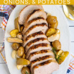 Pinterest Pin with Text, Pork Loin with Apples, Onions, and Potatoes. Image showing sliced pork on serving platter.