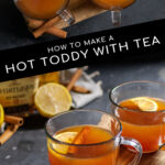 Pinterest Pin with text overlay 'How to make a Hot Toddy with Tea'. Image of clear mugs filled with hot toddy and garnished with a cinnamon stick and lemon slice.