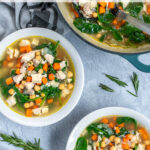 Pinterest Pin with text Healthy Leftover Turkey Soup, image of bowls and a pot of takers soup with spinach, beans, and carrots.