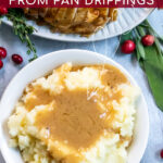Pinterest Pin with text, Turkey Gravy From Pan Drippings. With Bowl of mashed potatoes covered in golden turkey gravy.