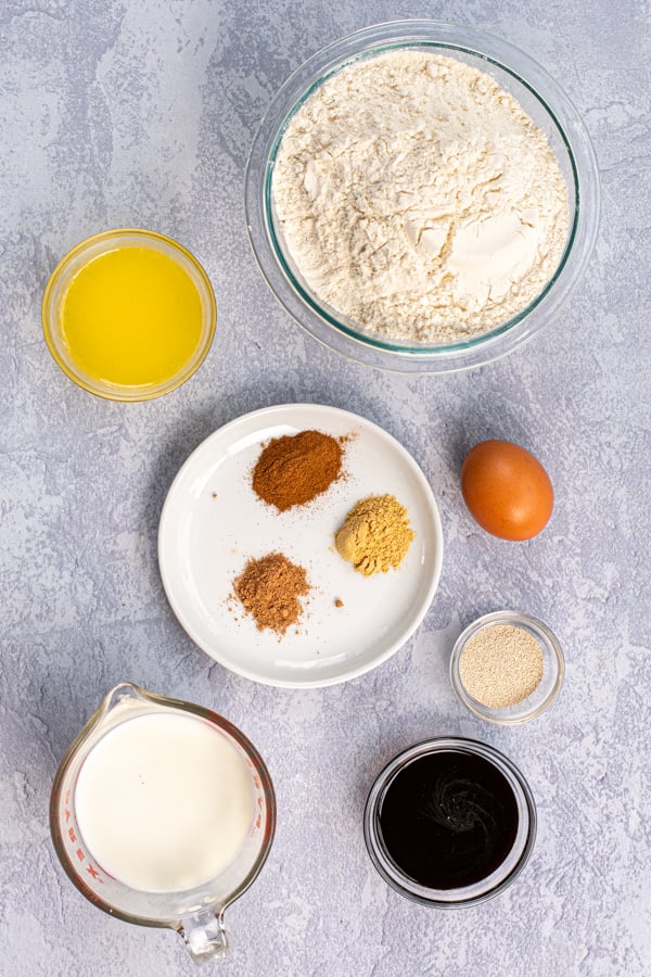 All the ingredients needed to make the dough of gingerbread cinnamon rolls.