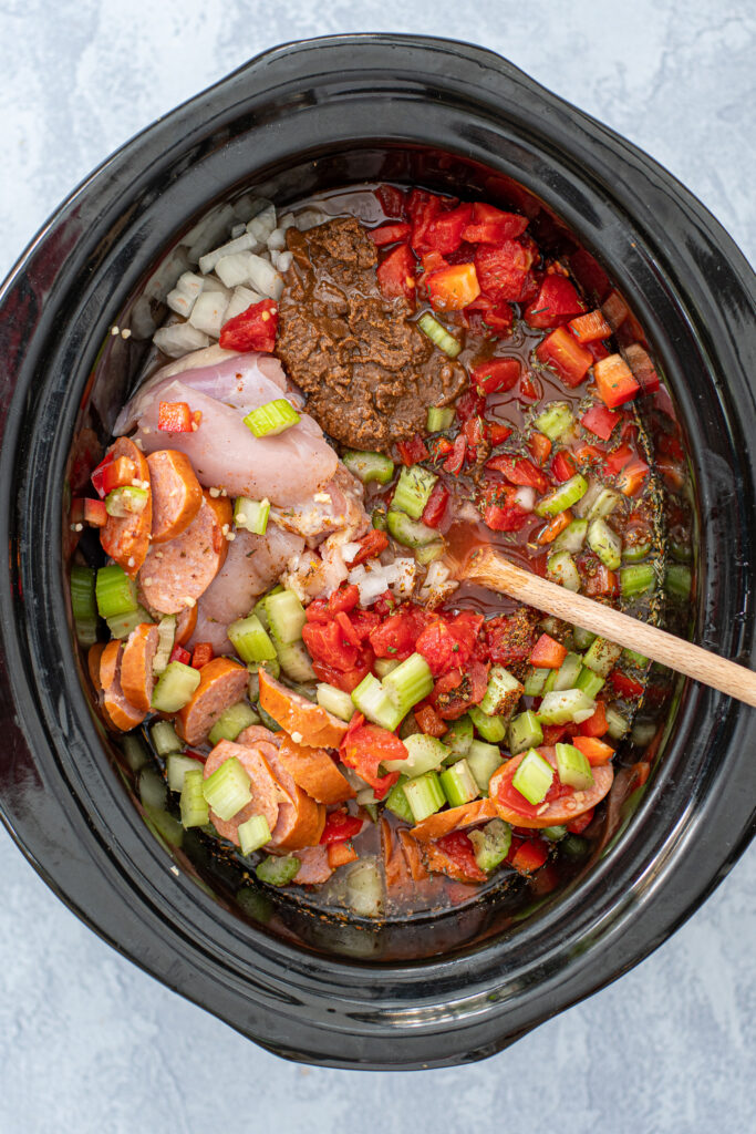 Add a dark brown roux to the crockpot before stirring it in.