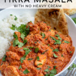Pinterest Pin with text overlay 'Chicken Tikka Masala with no heavy cream', image of bowl of chicken tikka masala next to a bed of rice.