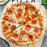 Pinterest Pin with text "How to make Homemade Pizza", image of a cooked pizza.