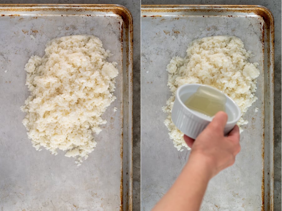 Making sushi rice by putting cooked rice on a sheet pan and muring rice vinegar mixture on it.