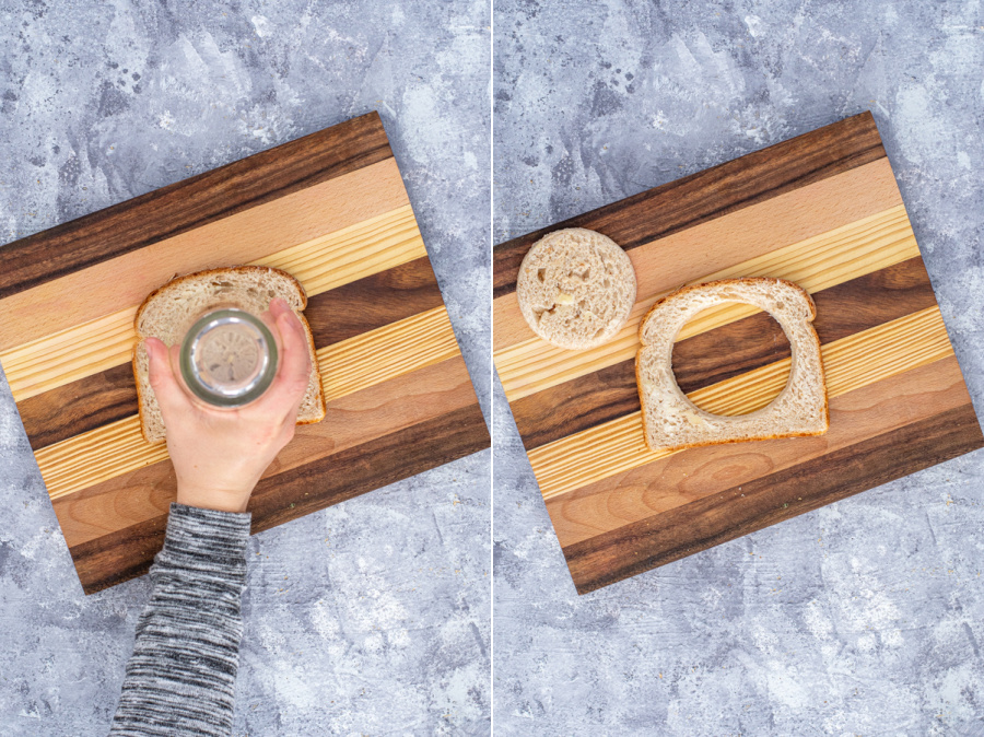 Cutting a hole in the center of a buttered piece of bread with a drinking glass leaving a hole in the center.