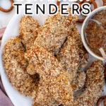 Pinterest Pin with text 'Pretzel Crusted Chicken Tenders', image of stack of chicken tenders on a plate next to honey mustard.