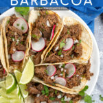 Pinterest Pin with text overlay 'Crockpot Barbacoa', image of plate with a bunch of tacos filled with barbacoa and garnished with cilantro.