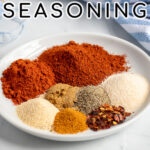 Pinterest Pin with text 'Fajita Seasoning', image of a plate of spices.
